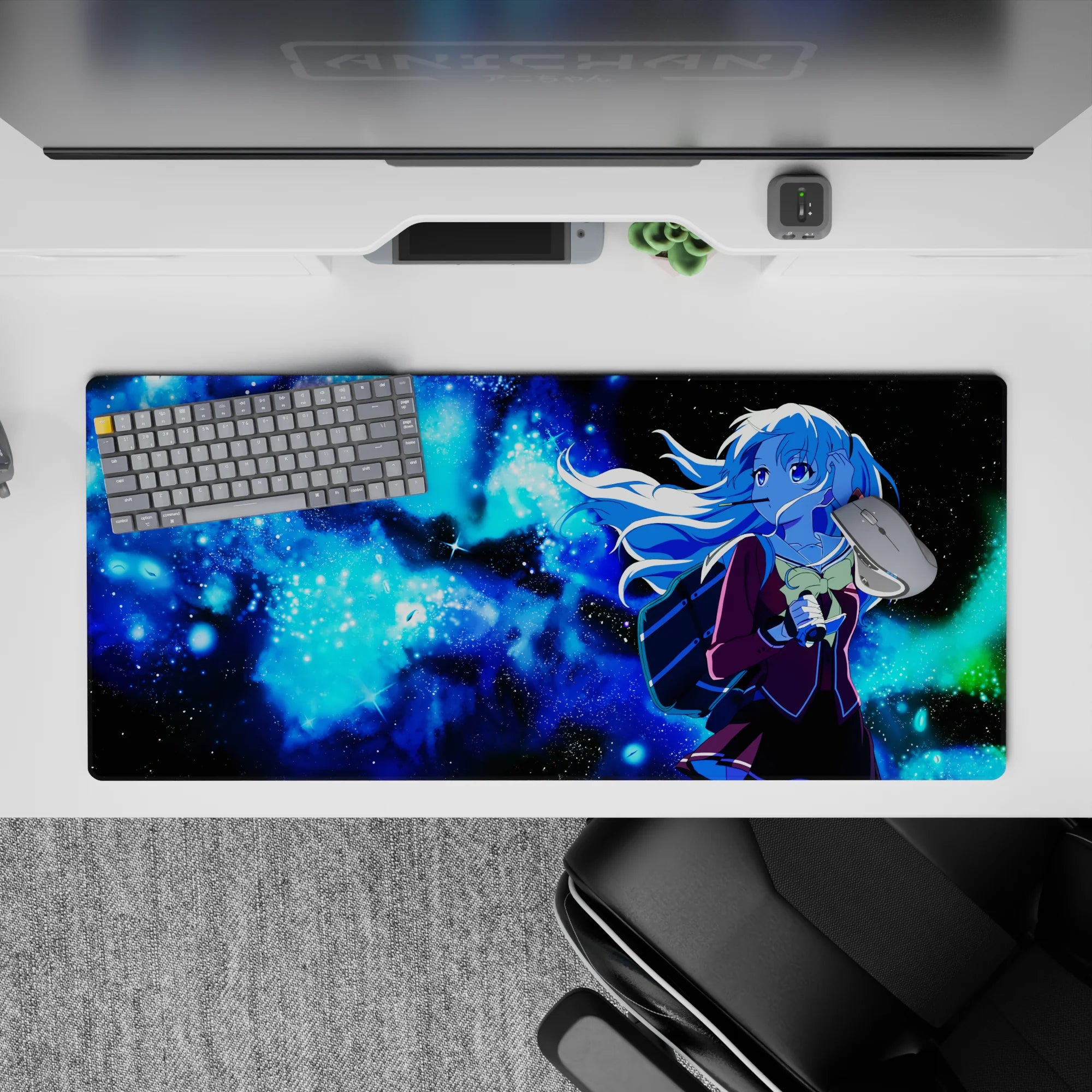 Cosmic anime girl desk pad 36x16 inches in icy blue gradients with glitter-like stars and dreamy mood.