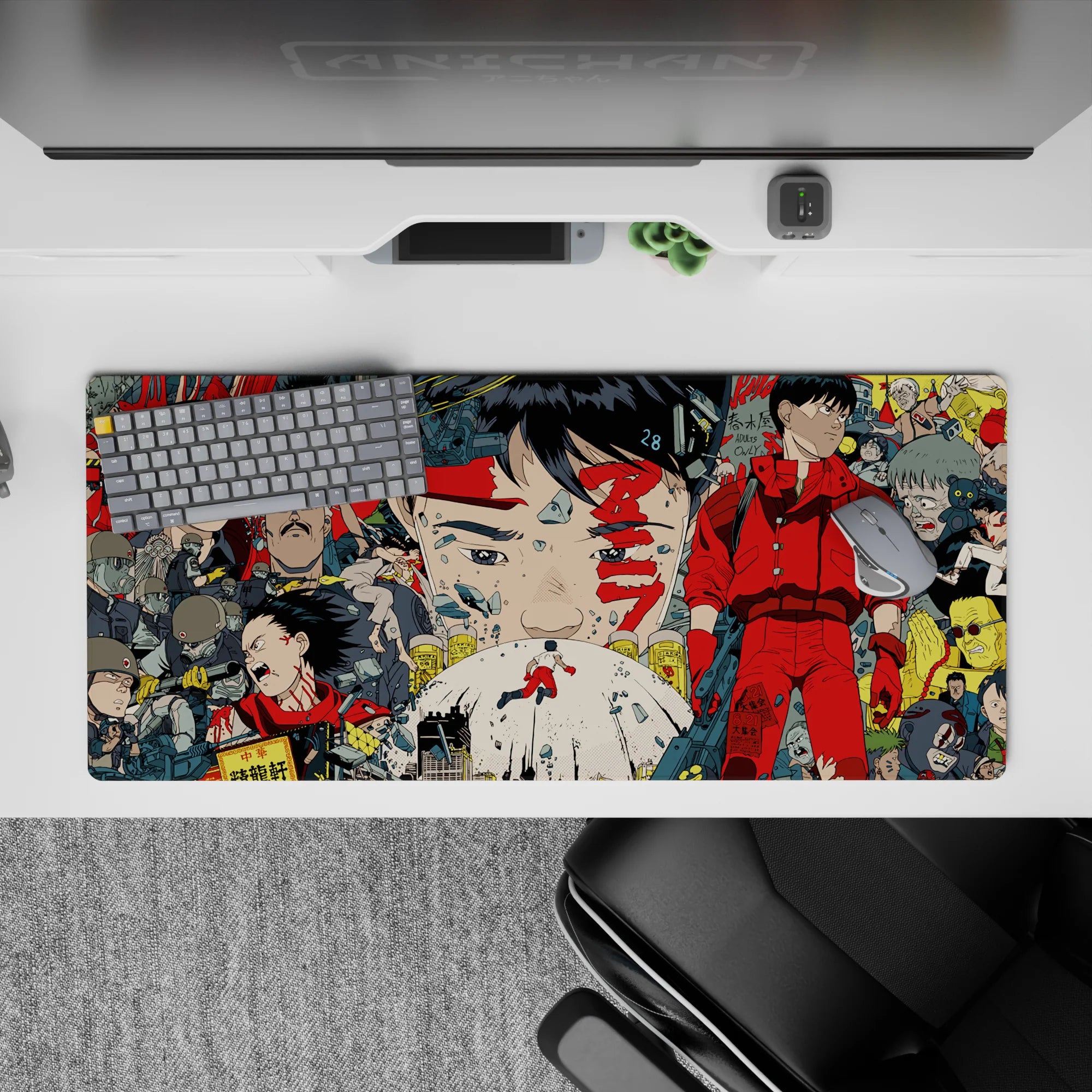 Neon red and gunmetal gray anime desk pad 36x16 inches, ink-black lines and tense cyberpunk mood.