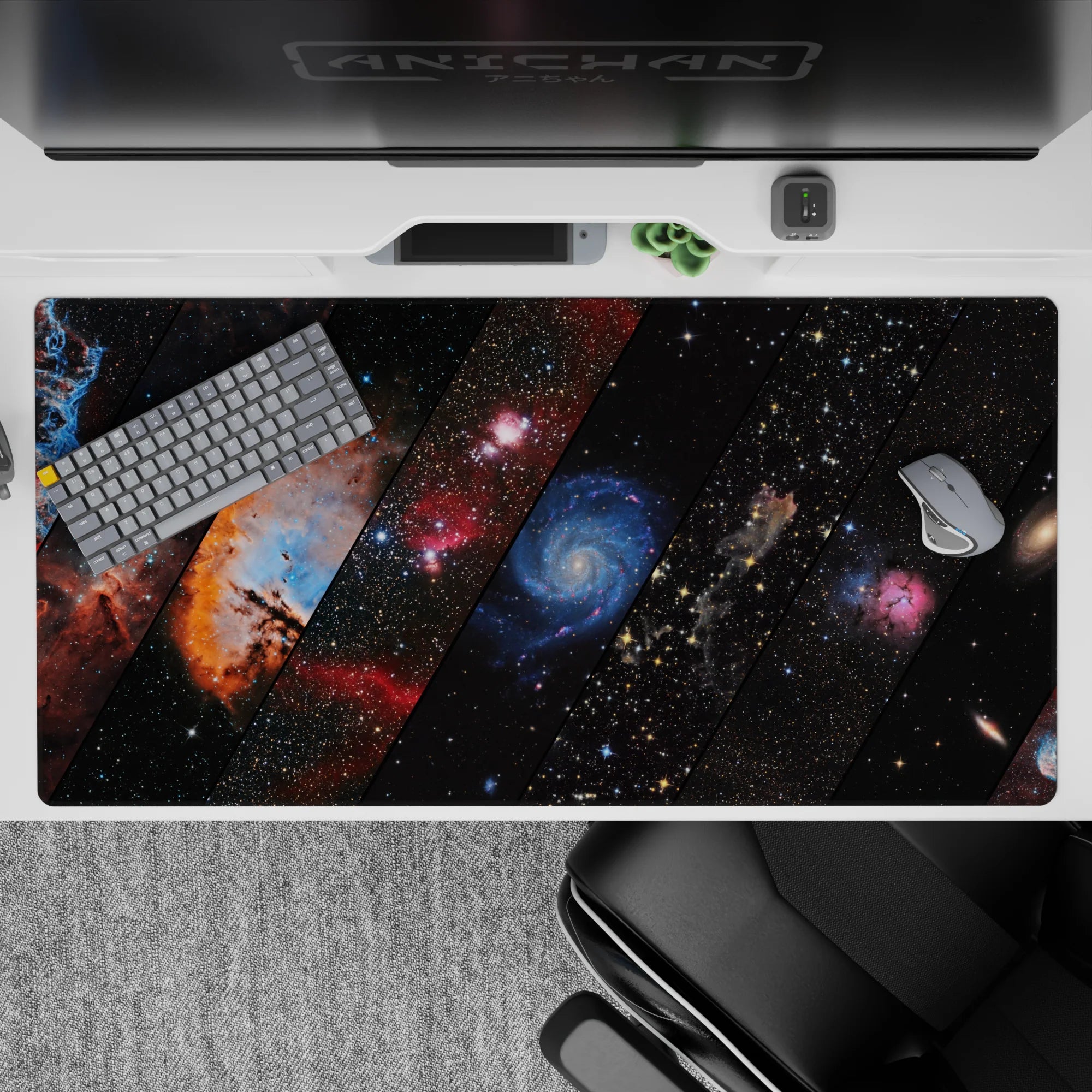 Moody cosmic desk pad 40x20 inches in teal, ember orange, blush pink, deep blue, and black.