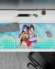 36x16 inches kawaii mouse pad in aqua and lilac tones with dreamy frills, tidy magical desk vibe.