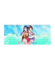 28x12 inches anime girl mouse pad with sparkly aqua dots, pastel zigzags, and lilac frill outfits.