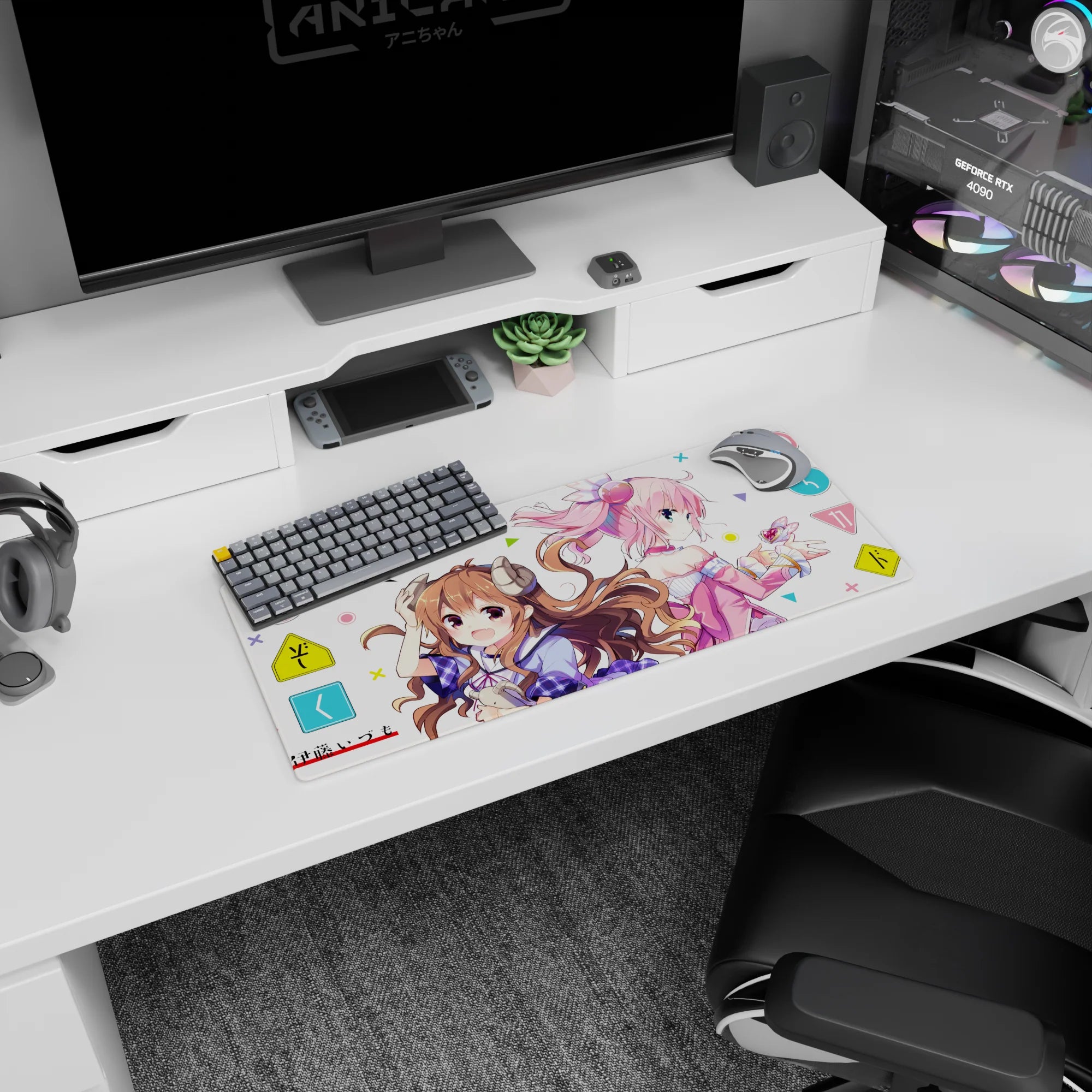 28x12 inches mouse pad showing brown-curled horn girl grinning beside pink-haired headphone girl staring over shoulder.