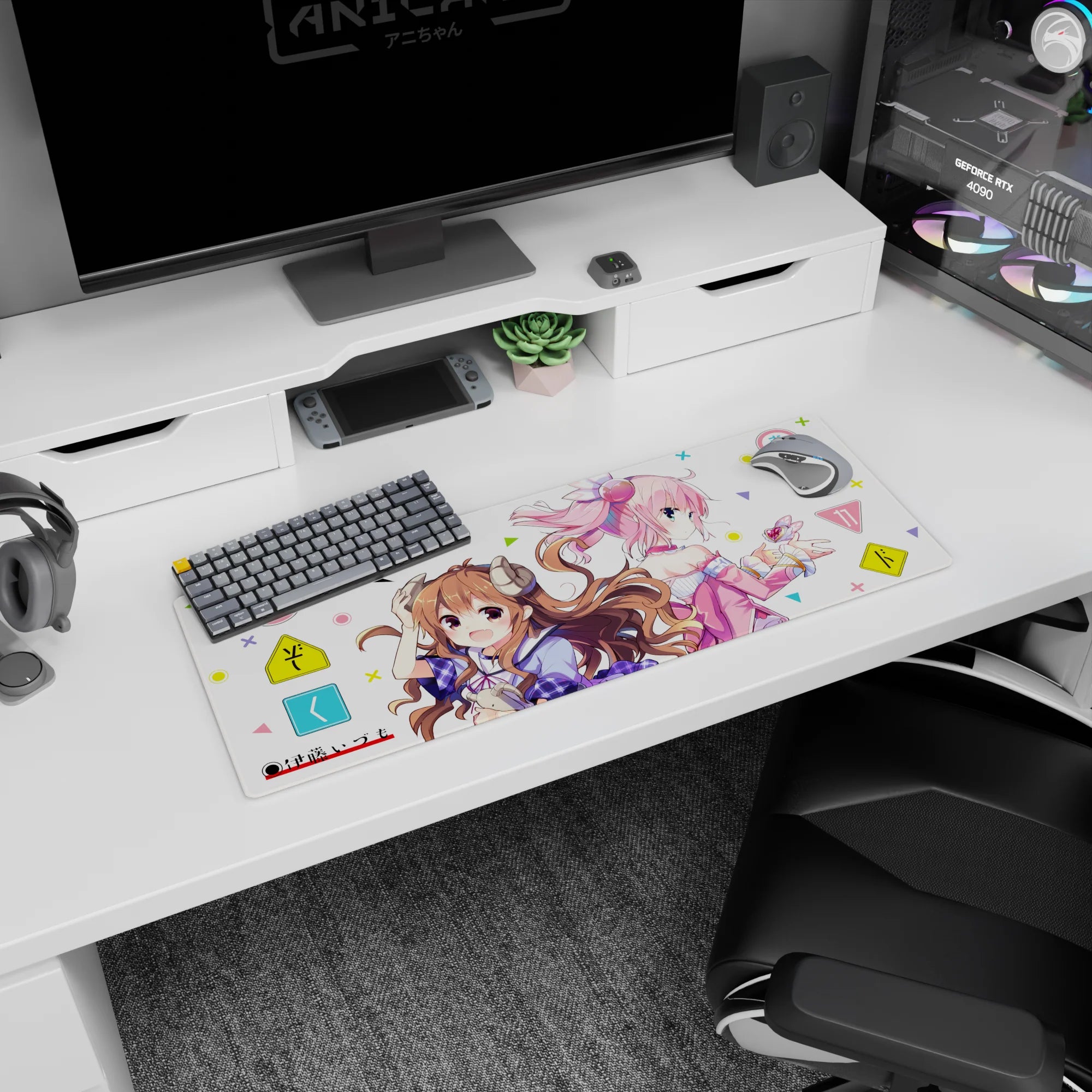 32x12 inches anime mouse pad showing curly brown girl with tiny horns and pink girl in headphones.