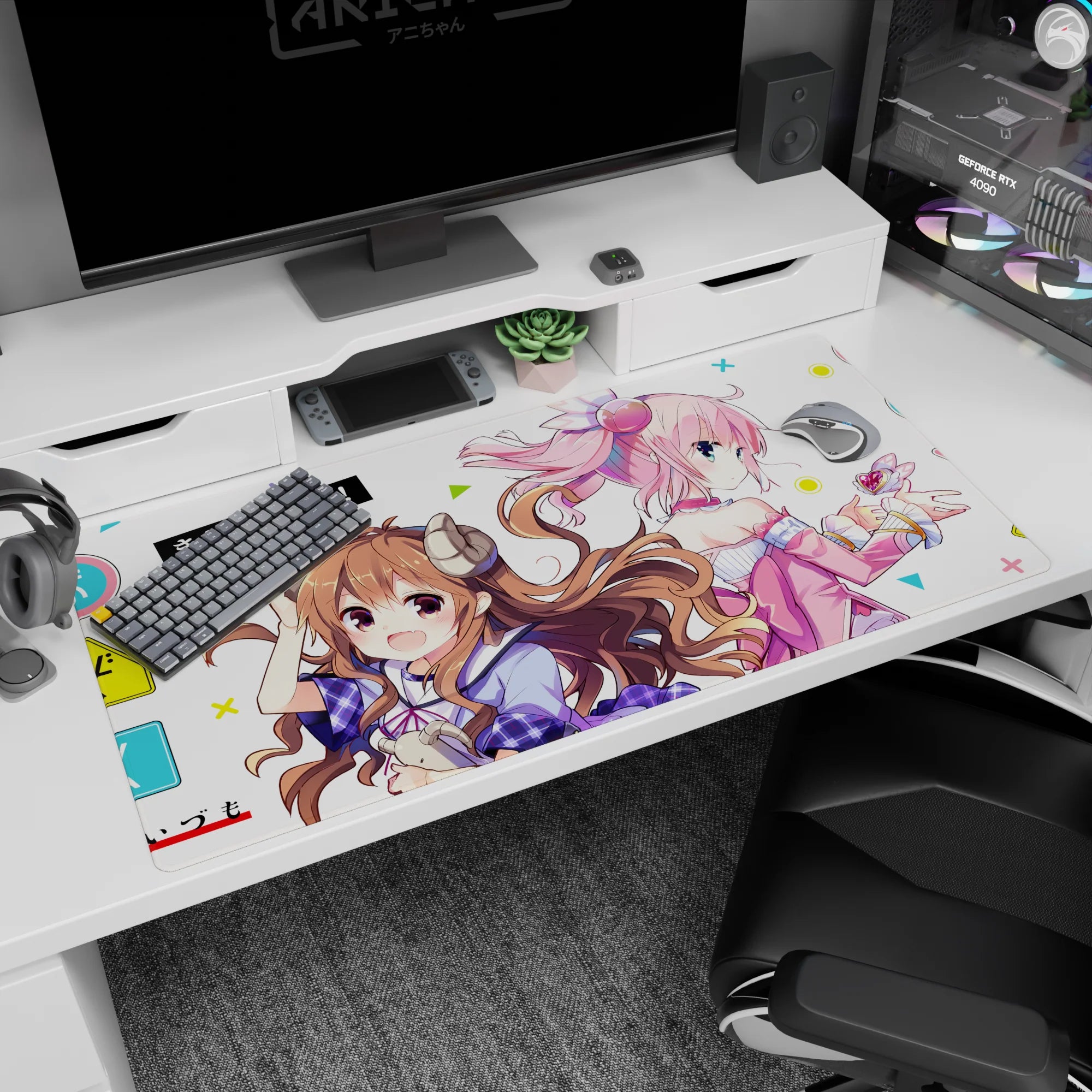 40x20 inches anime desk pad featuring curly brown girl with tiny horns and pink-haired girl with headphones.