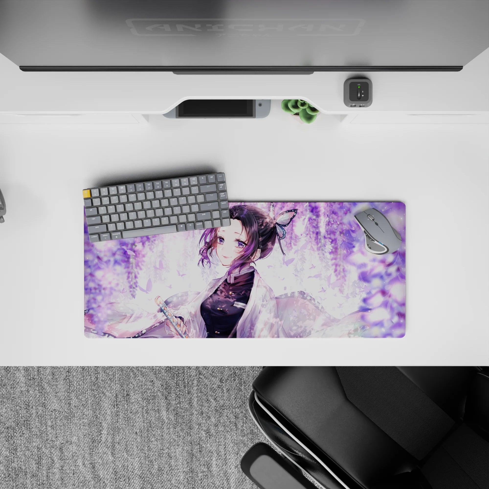 Mouse pad featuring Shinobu from anime, 28x12 inches, with lilac swirls, petals, and pastel butterflies under wisteria.