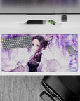 Anime mouse pad featuring Shinobu from Demon Slayer under wisteria, 32x16 inches. Soft lilac swirls and pastel butterflies.