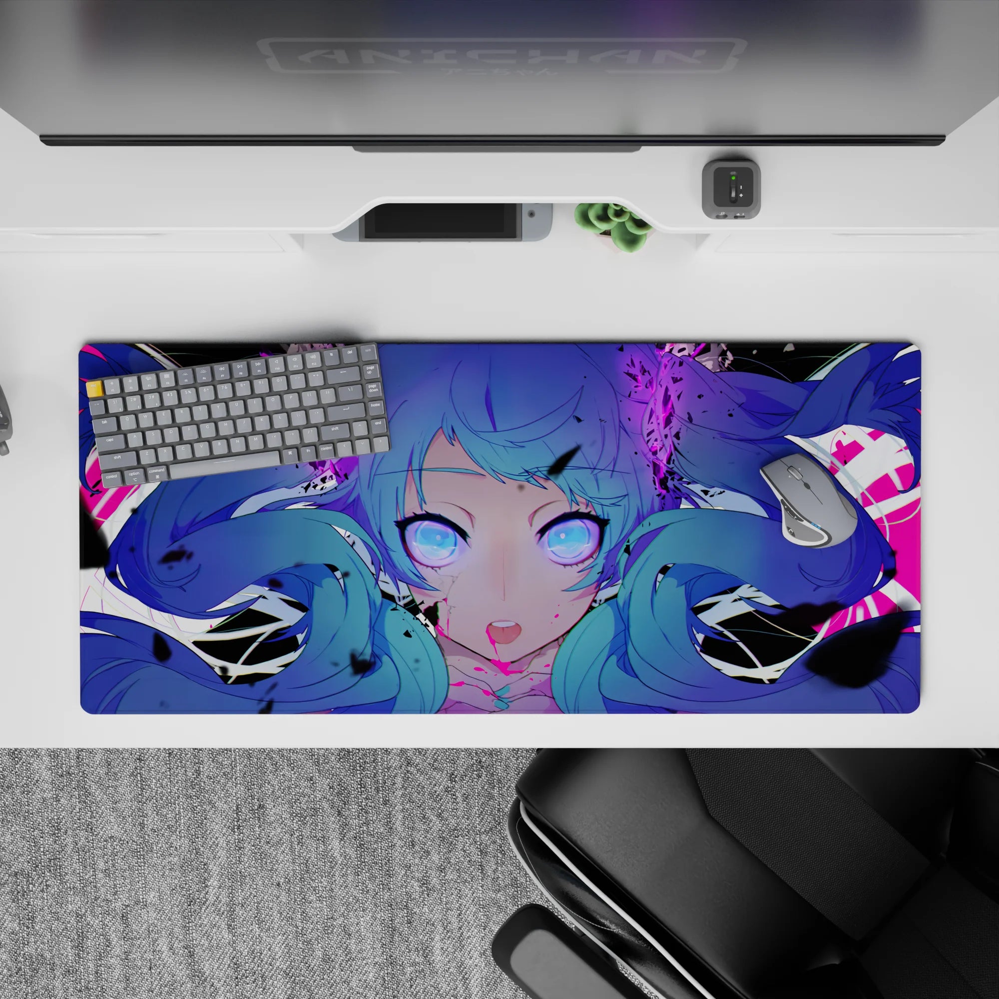36x16 inches desk pad in neon violet and magenta, spooky-cute anime vibe with glowing eyes.