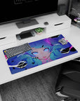 32x16 inches anime girl mouse pad featuring a blue twin-tail girl with glowing violet eyes staring forward.