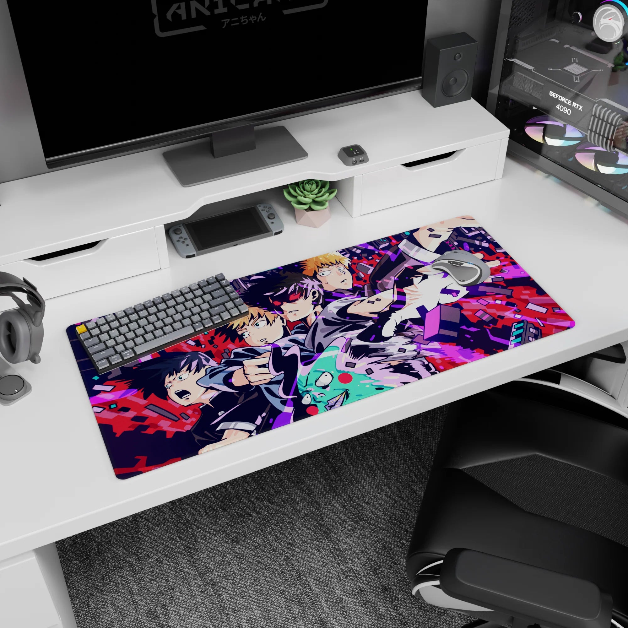 Mob reaches forward with blazing eyes as Reigen reacts on anime desk pad, 36x16 inches.