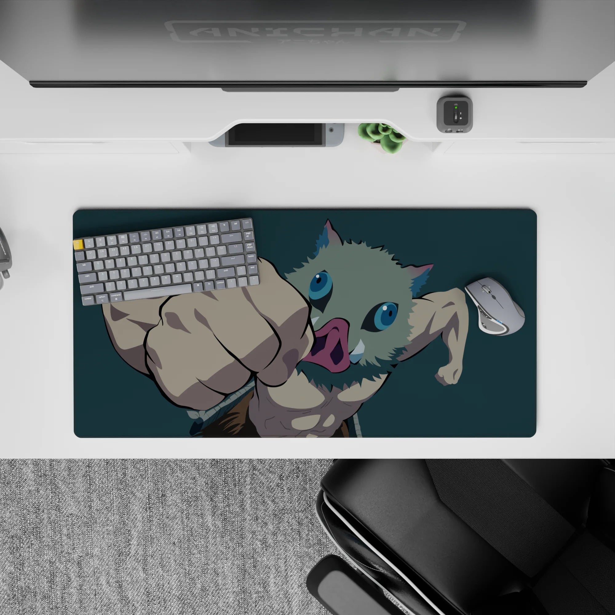 Anime mouse pad 32x16 inches featuring Inosuke from Demon Slayer mid-punch with a deep teal backdrop highlighting details.