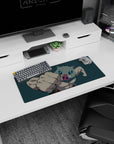 Anime mouse pad 28x12 inches featuring Inosuke from Demon Slayer, mid-punch with a boar mask, teal backdrop.