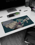 Anime mouse pad 32x16 inches featuring Inosuke from Demon Slayer mid-punch with boar mask, teal backdrop, and intense gaze.