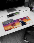 32x12 inches anime girl mouse pad featuring a pink-haired swordfighter in tall grass under warm sunset clouds.