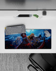 Night-battle anime girl mouse pad 28x12 inches with deep blues, storm clouds, red petals, and metal shine.