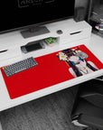 36x16 inches desk pad showing anime girl with finger-to-lip pose, long black hair, teal streaks.