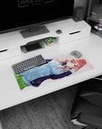 28x12 inches mouse pad showing a sweet red-haired anime girl under drifting pink petals, headphones at neck.