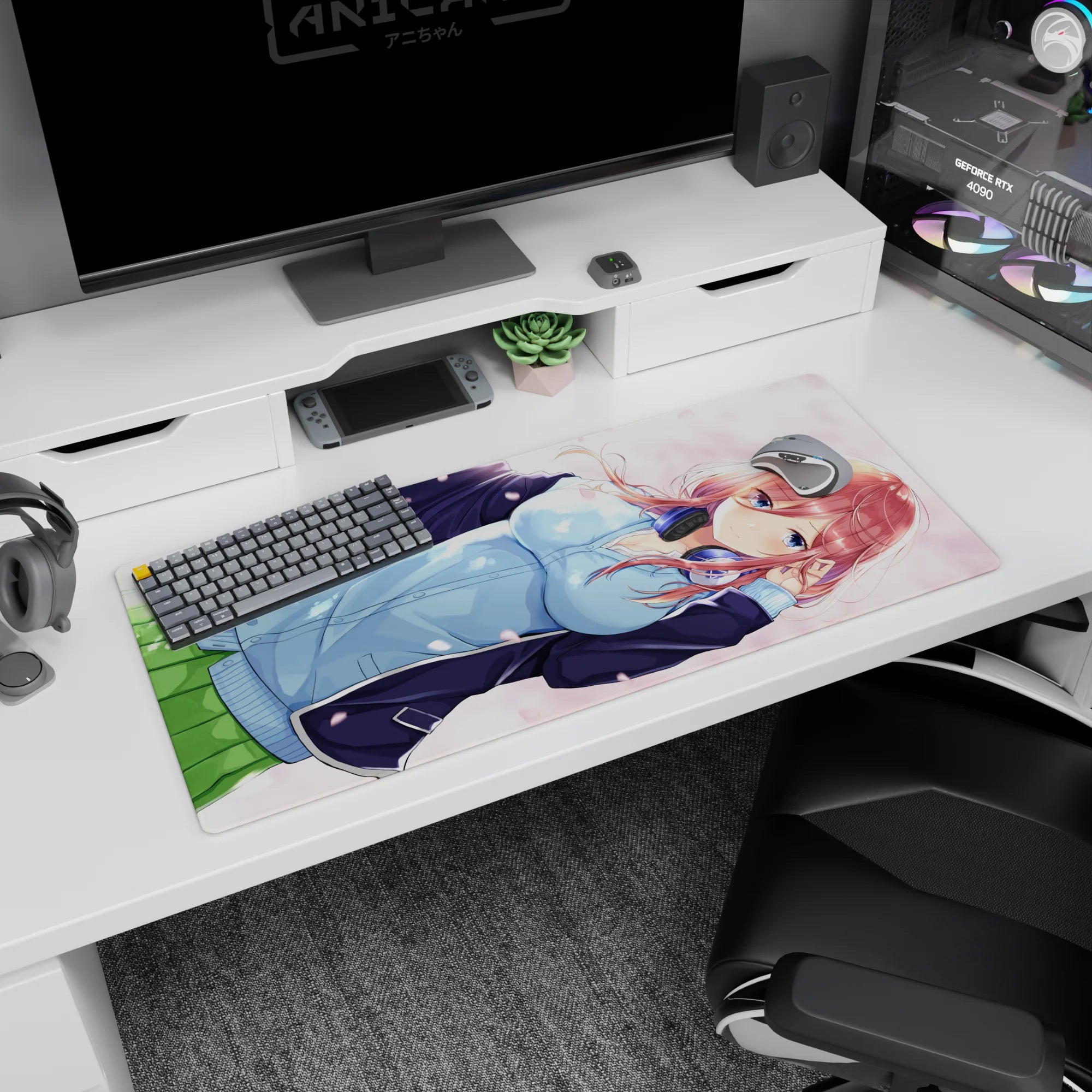 36x16 inches desk pad showing blue-eyed red-haired anime girl with headphones, petals drifting around.
