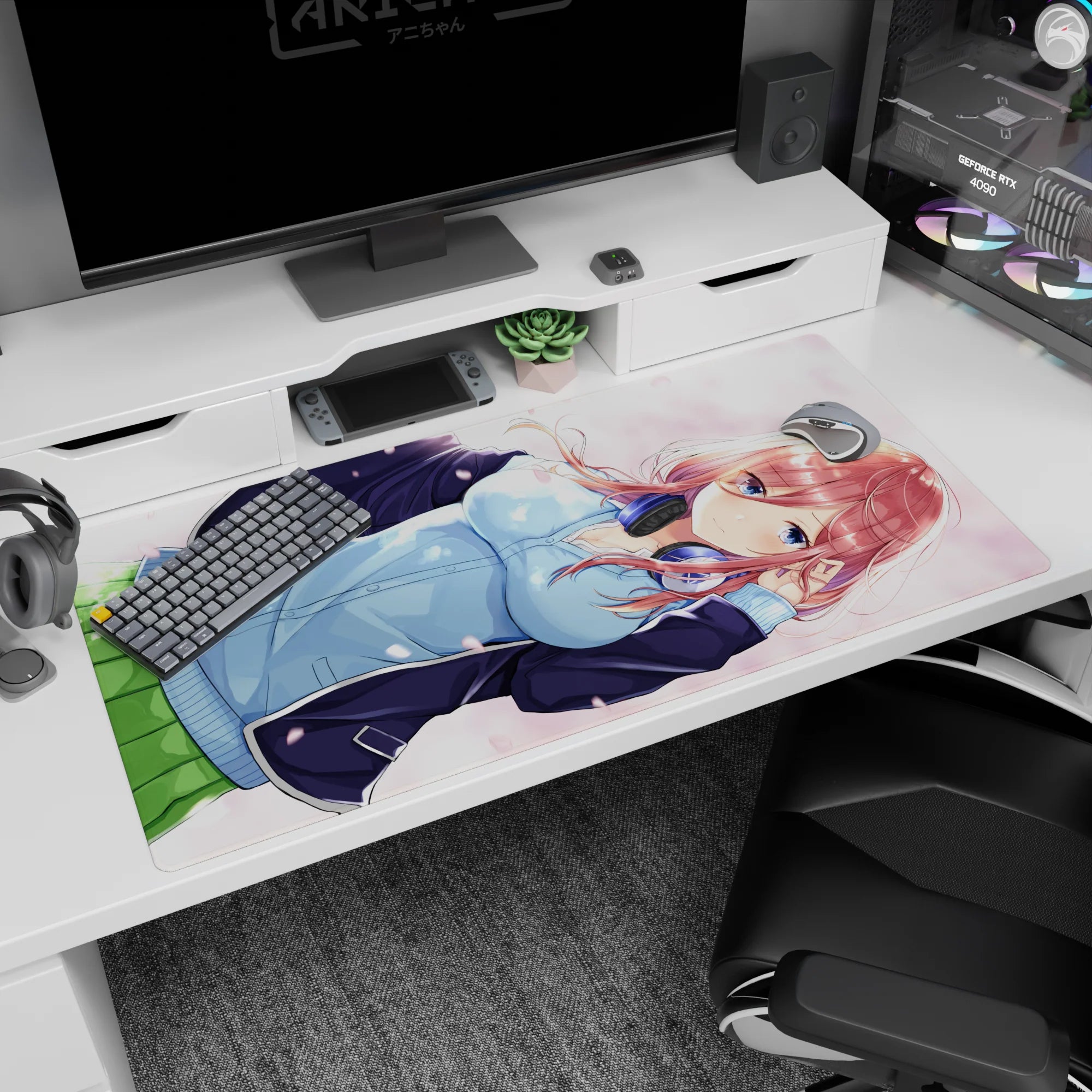 Red-haired anime girl with headphones and blue hoodie under drifting petals desk pad 40x20 inches.