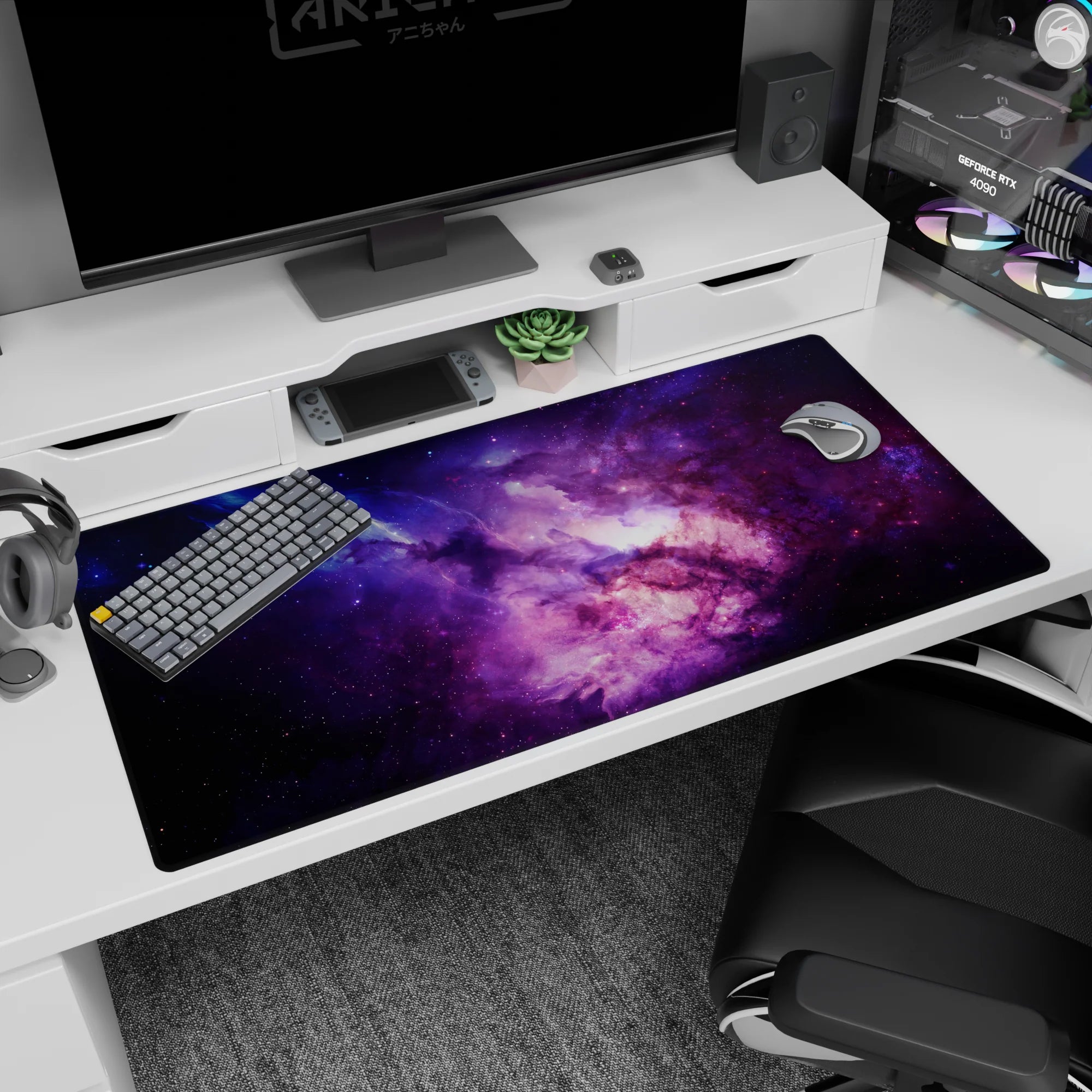 Starry nebula scene desk pad 40x20 inches, bright cosmic cloud and speckled stars across the desk.