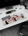 32x16 inches anime mouse pad of a central kimono dancer, crimson ribbons, birds and rooftop silhouettes.