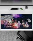 32x16 inches anime mouse pad in warm orange firelight under a deep violet starry sky, cozy mood.