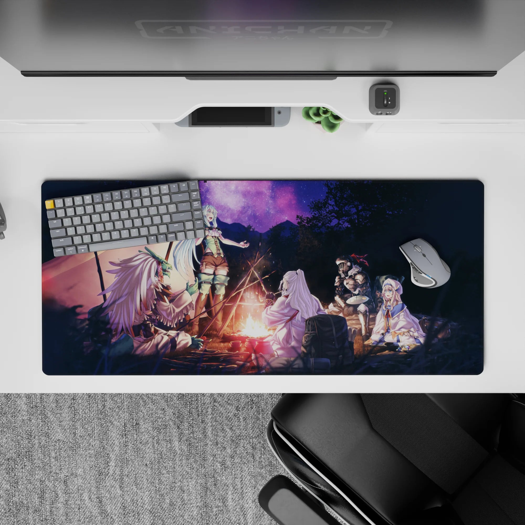 36x16 inches anime desk pad in warm orange firelight with deep violet night sky and starry glow.