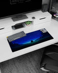 28x12 inches anime mouse pad showing a couple sitting on a grassy hill under a sky full of stars.