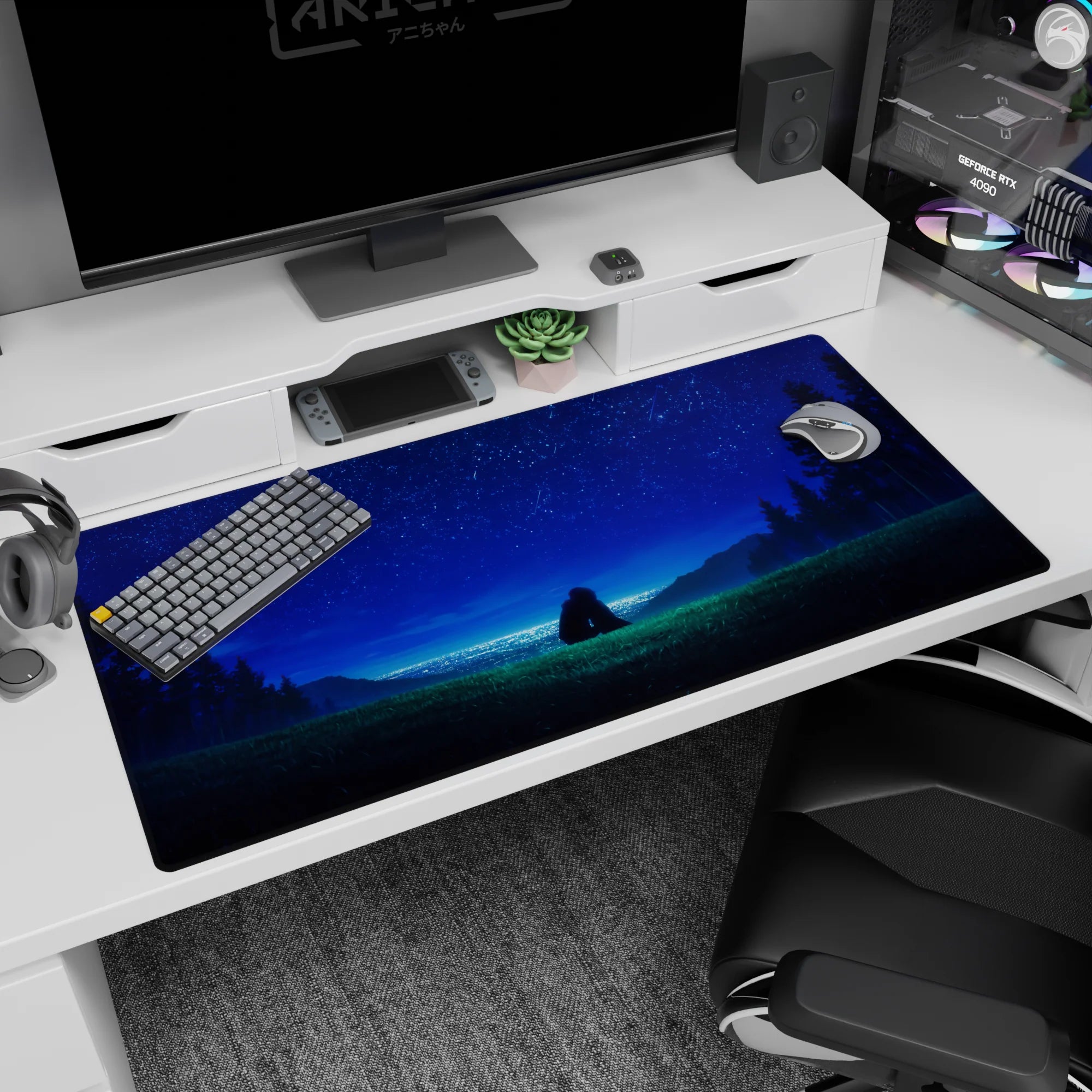 Two characters sitting close on a grassy hill under a sapphire star sky on an anime desk pad 40x20 inches.