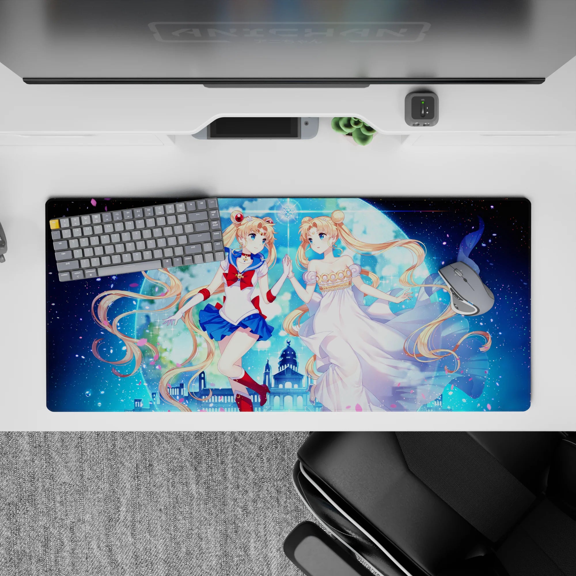 36x16 inches galaxy blue desk pad with pink petals, dreamy moonlight glow, and romantic anime vibes.
