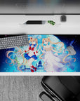 36x16 inches galaxy blue desk pad with pink petals, dreamy moonlight glow, and romantic anime vibes.