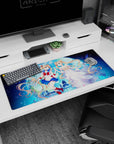 36x16 inches Sailor Moon desk pad showing Usagi Tsukino and Princess Serenity reaching hands in the sky.