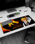 Meliodas stares forward with sword raised on anime desk pad, crisp details, 36x16 inches.