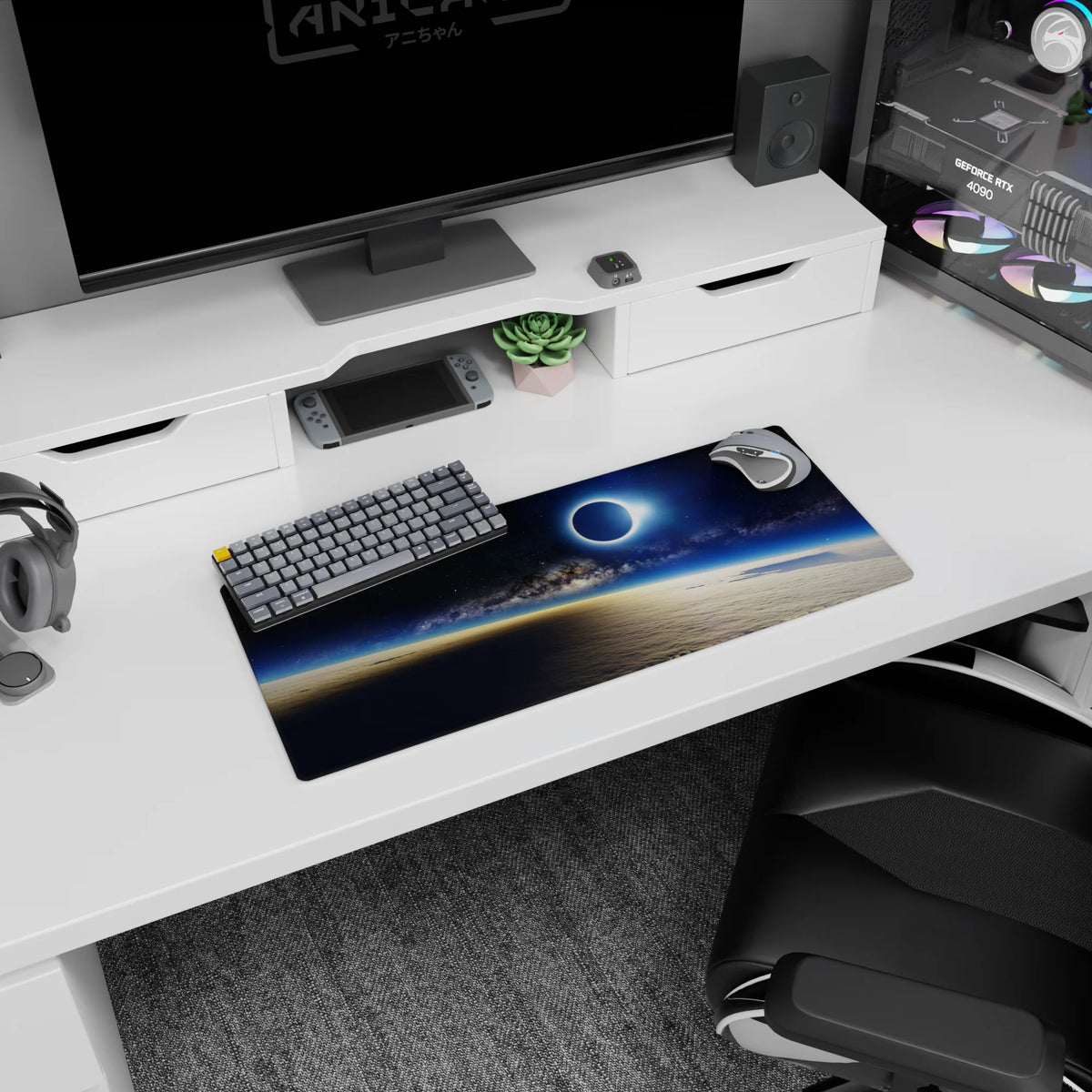 Glowing eclipse over a calm pale horizon mouse pad with smoky galaxy band, 28x12 inches.