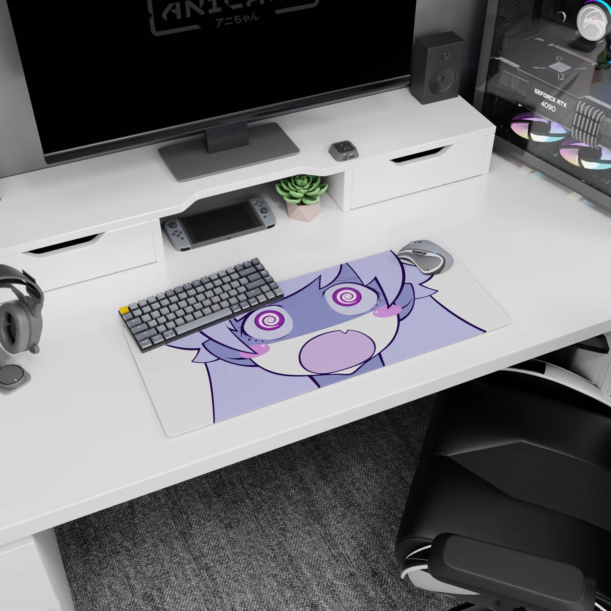 Chibi anime girl with puffy cheeks and wide spiral eyes staring at you on desk pad, 28x12 inches.