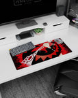 28x12 inches anime mouse pad showing blond fighter in dark suit and gold tie swinging a giant scissor blade.