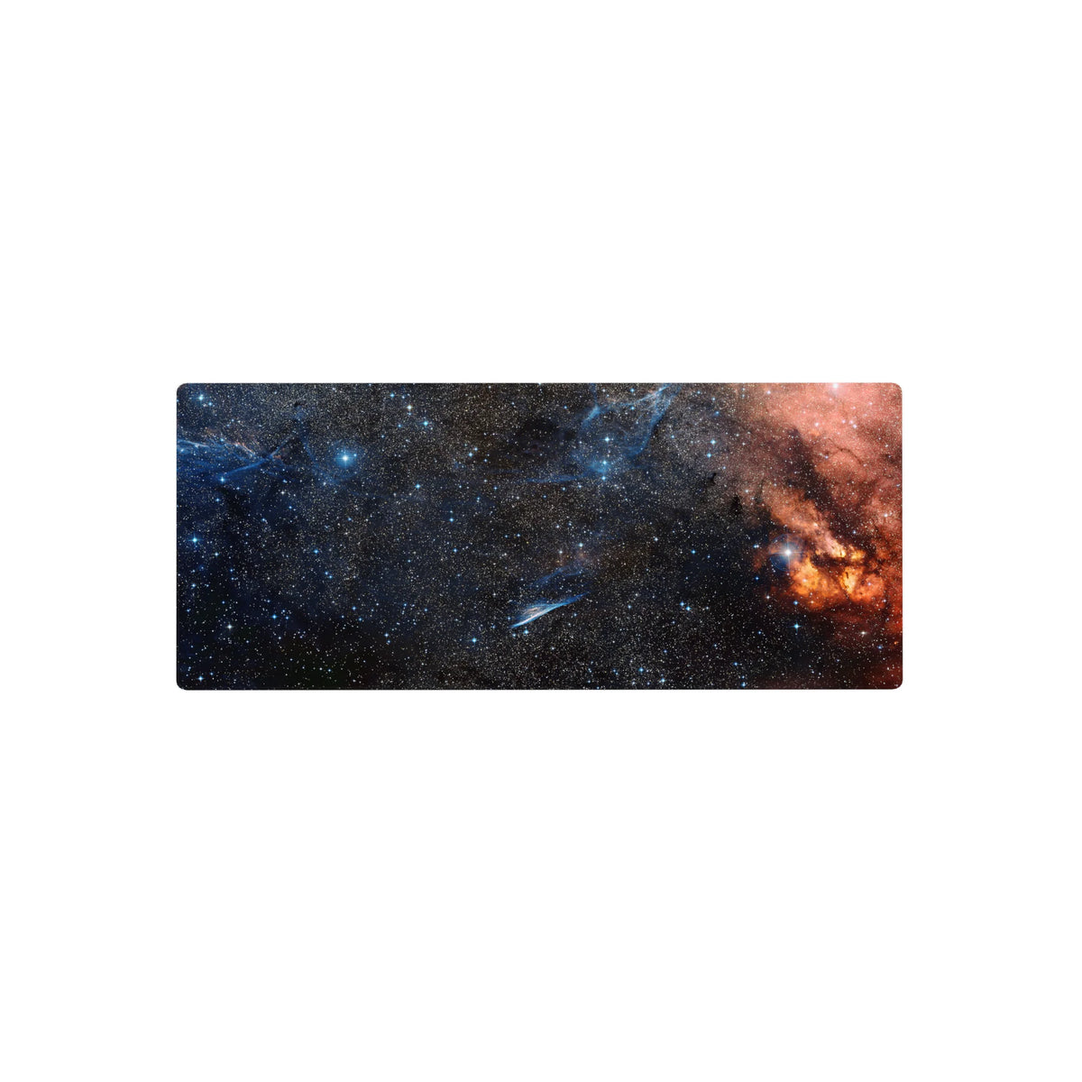 Midnight galaxy desk mouse pad 28x12 inches with swirling stars and an orange nebula edge.