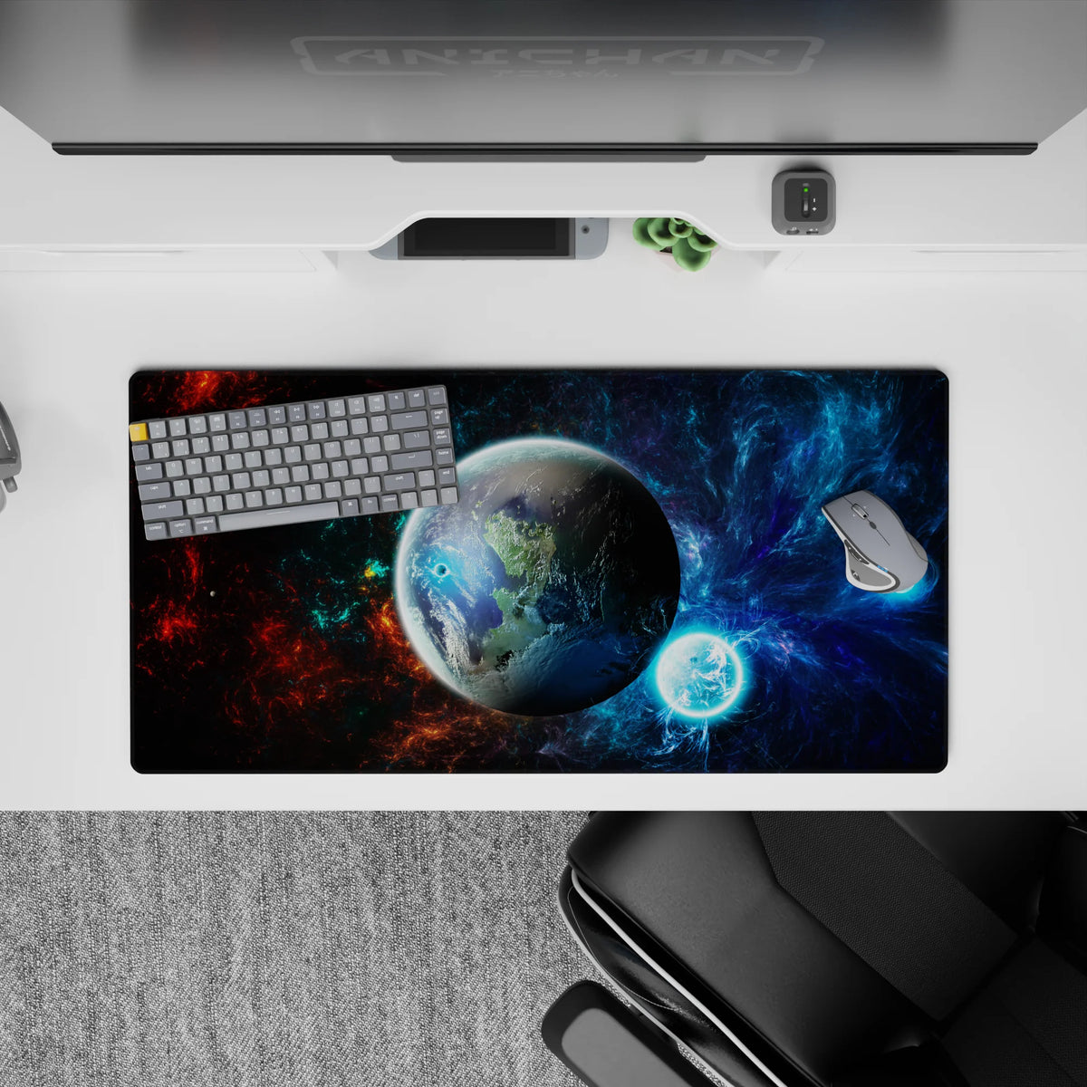 Moody blue-black nebula mouse pad 32x16 inches with red cloud accents and star-speckled texture.