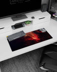 Deep-space nebula cloud scene mouse pad 28x12 inches with confetti-like stars over a dark sky.