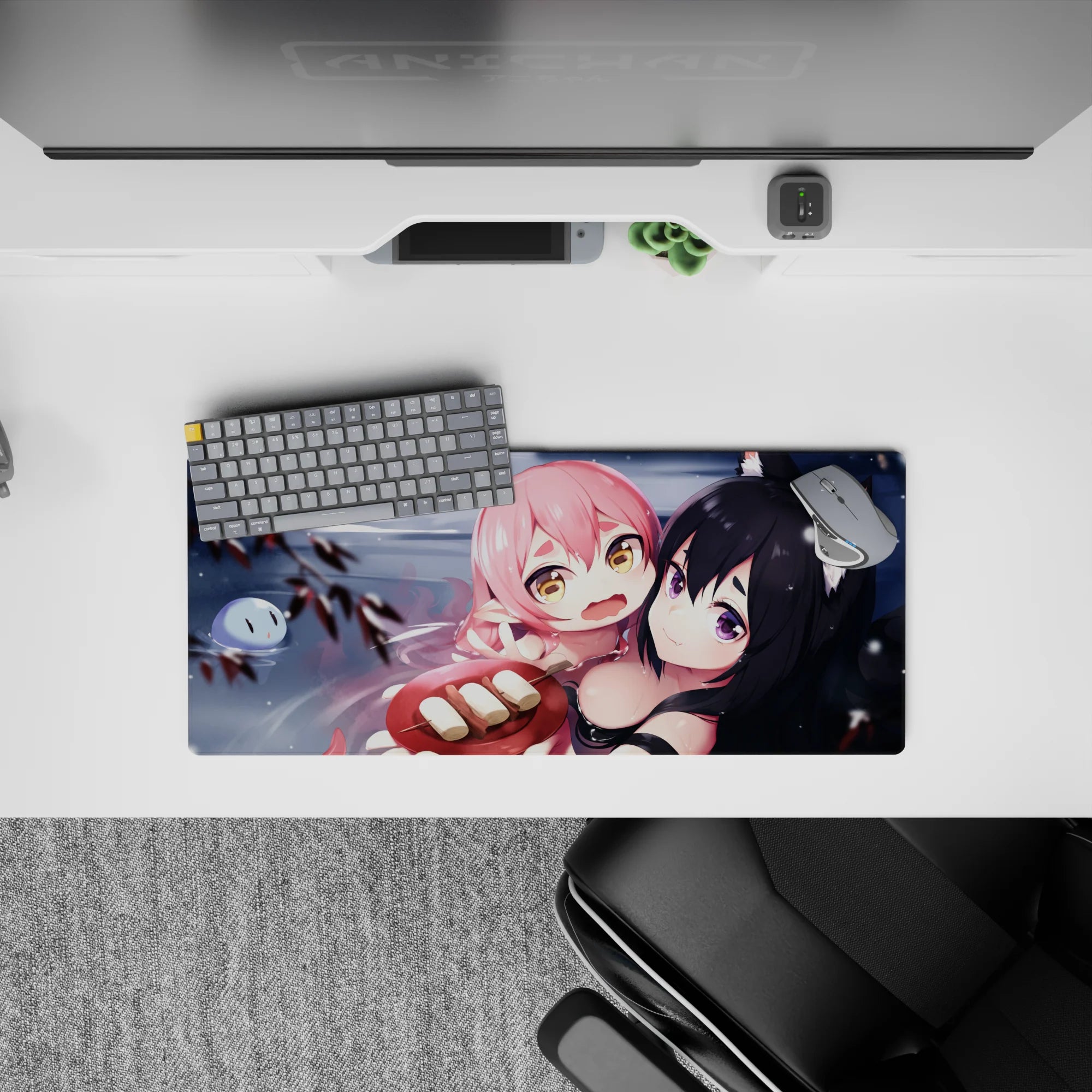 Cozy chaos anime girl mouse pad 28x12 inches in cool gray water, blush accents, and soft snow specks.