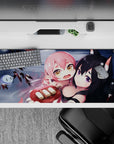 Cozy chaos anime desk pad 36x16 inches in cool grays with warm blush accents and cute floating faces.