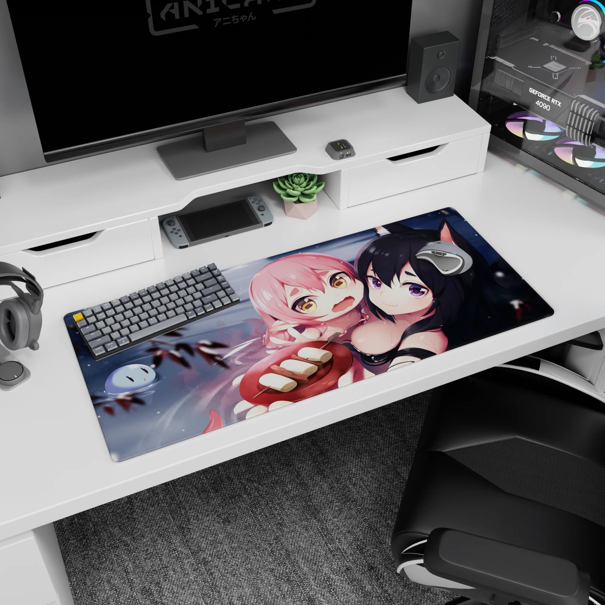 Pink-haired girl clinging to fox-eared black-haired anime girl desk pad 36x16 inches with drifting snow.