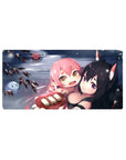 32x16 inches anime girl mouse pad with pink-haired girl cuddling a fox-eared black-haired smirk.