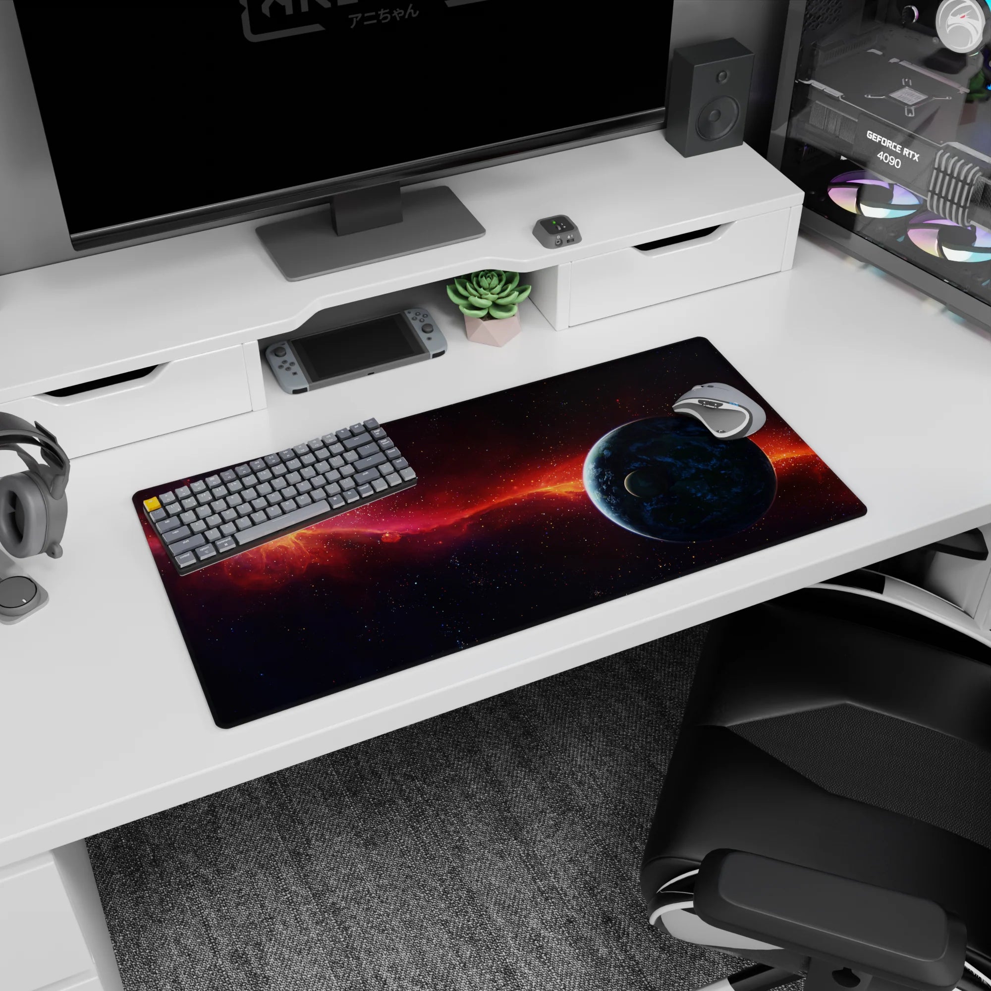 Nebula comet ribbon scene mouse pad 32x16 inches featuring an orange streak across stars and a blue planet.