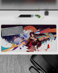 Anime girl mouse pad 32x16 inches in crimson, indigo, and gold with dreamy festival-night fireworks mood.