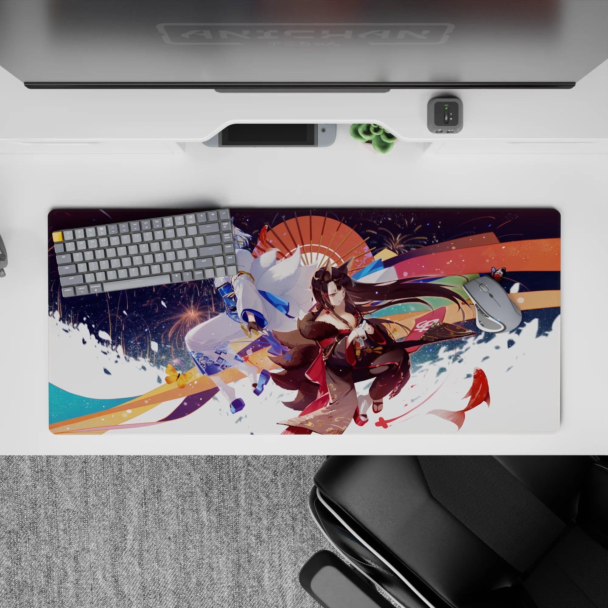 36x16 inches anime desk pad in crimson, gold, and indigo with festival-night glow and sparkling fireworks.