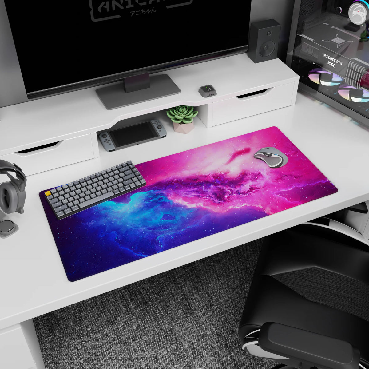 Starry nebula scene desk pad 36x16 inches, swirling space clouds with scattered starlight speckles.