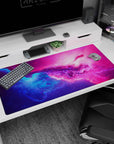 Nebula sky scene desk pad 40x20 inches featuring tiny star specks over blue-pink color waves.