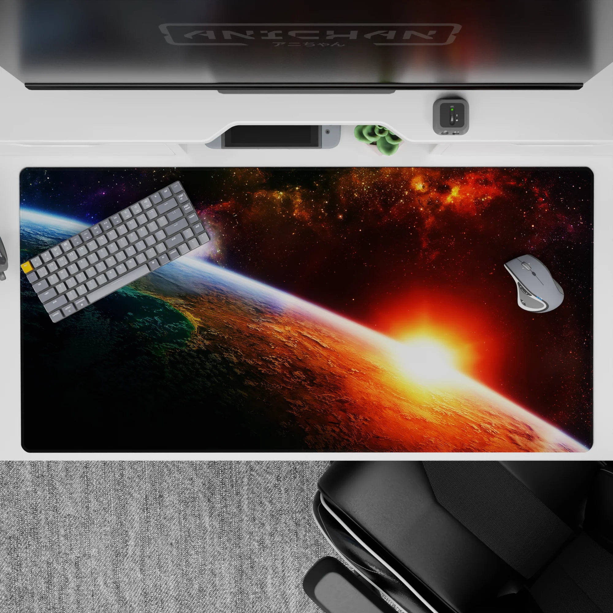 Warm orange-red sunrise desk pad 40x20 inches fading into inky black with a cool blue horizon edge.