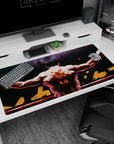 Back view anime boxer on ring ropes desk pad 40x20 inches, arms wide, wrapped wrists, shining ring lights.
