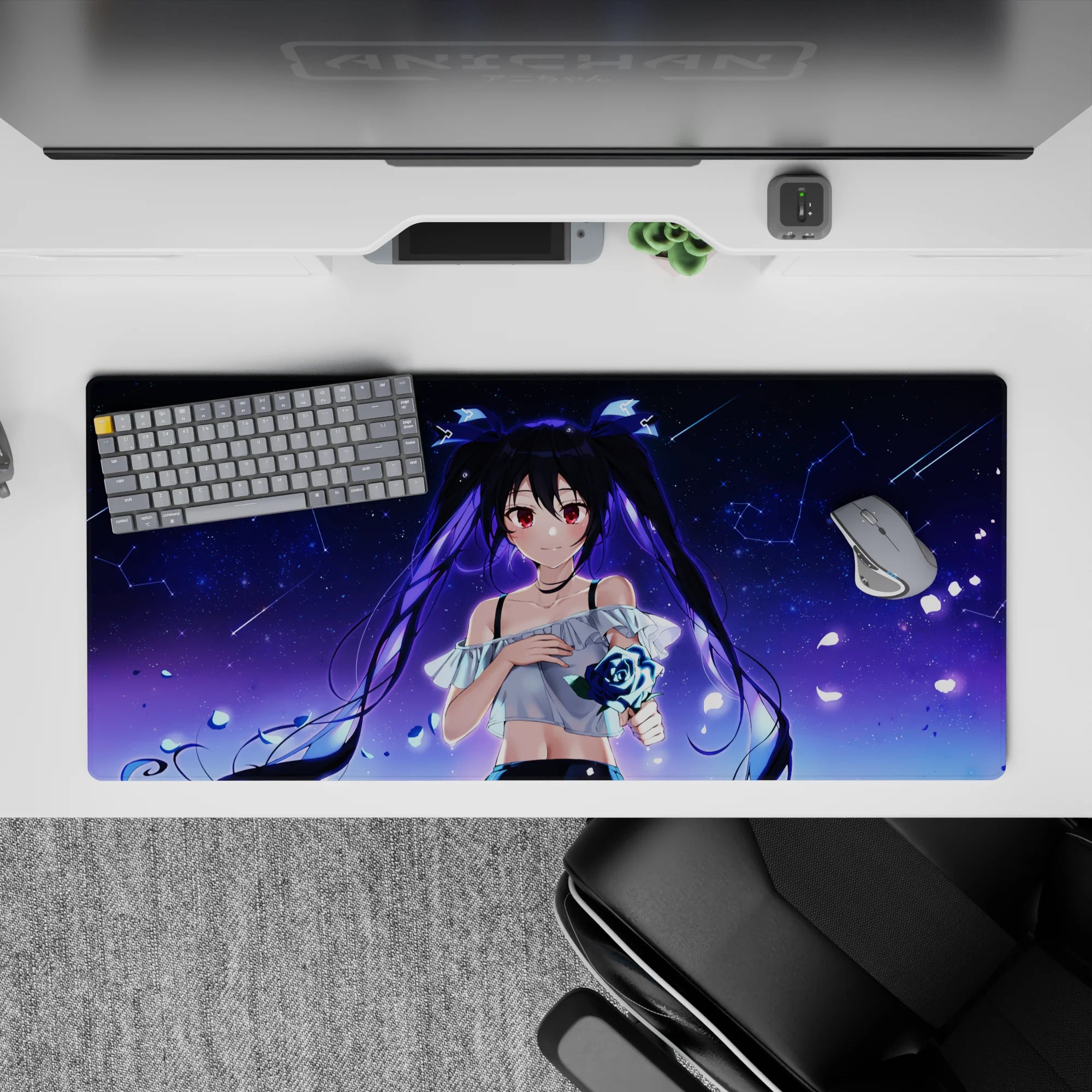 Dreamy indigo galaxy desk mat 36x16 inches with constellations, neon blue rose, soft romantic vibe.